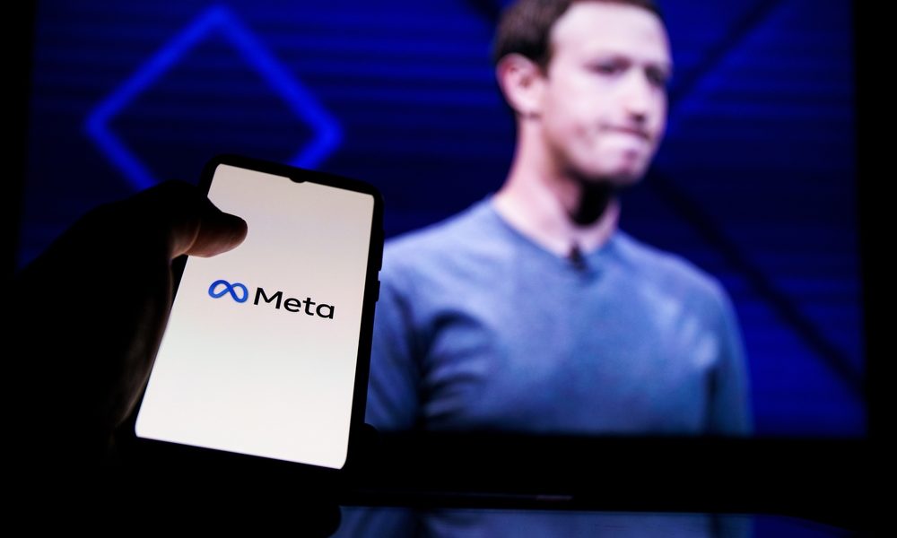 Kaunas,,Lithuania,2022,-,April,14:,Meta,Logo,On,Screen Kaunas, Lithuania 2022 - April 14: Meta logo on screen and Mark Zuckerberg is a Chief Executive Officer of Metaverse in background