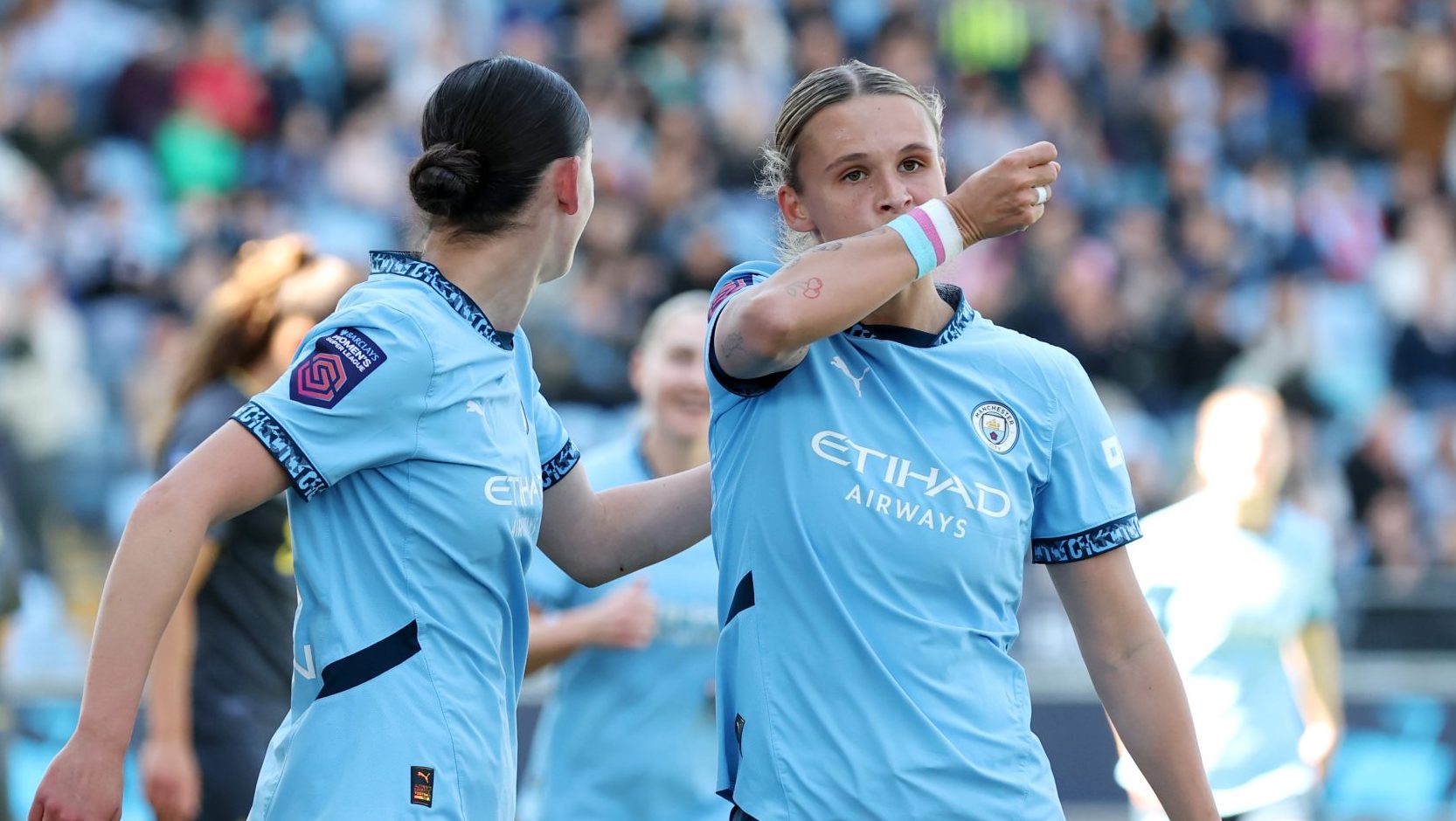 Kerstin Casparij of Manchester City kisses her wrist as she celebrates scoring her team's first goal during the Barclays Women's Super League match between Manchester City FC and Everton FC at Joie Stadium on April 20, 2025 in Manchester, England.