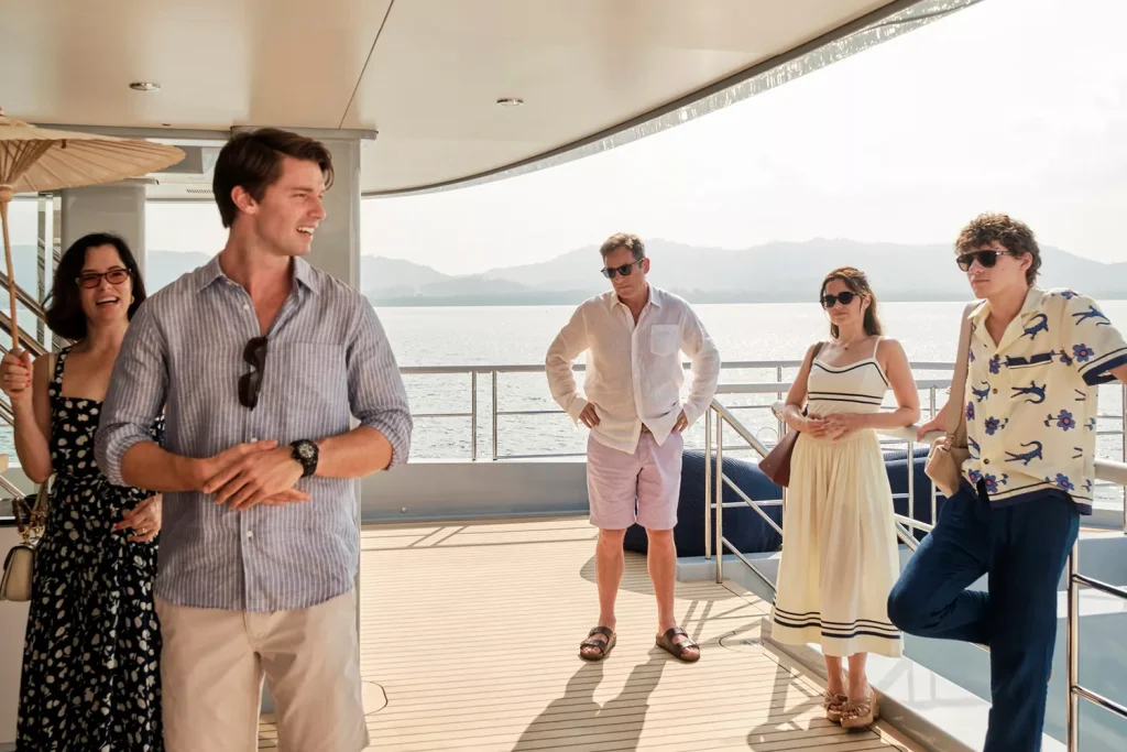 Parker Posey, Patrick Schwarzenegger, Jason Isaacs, Sarah Catherine Hook, Sam Nivola in The White Lotus. FABIO LOVINO/HBO