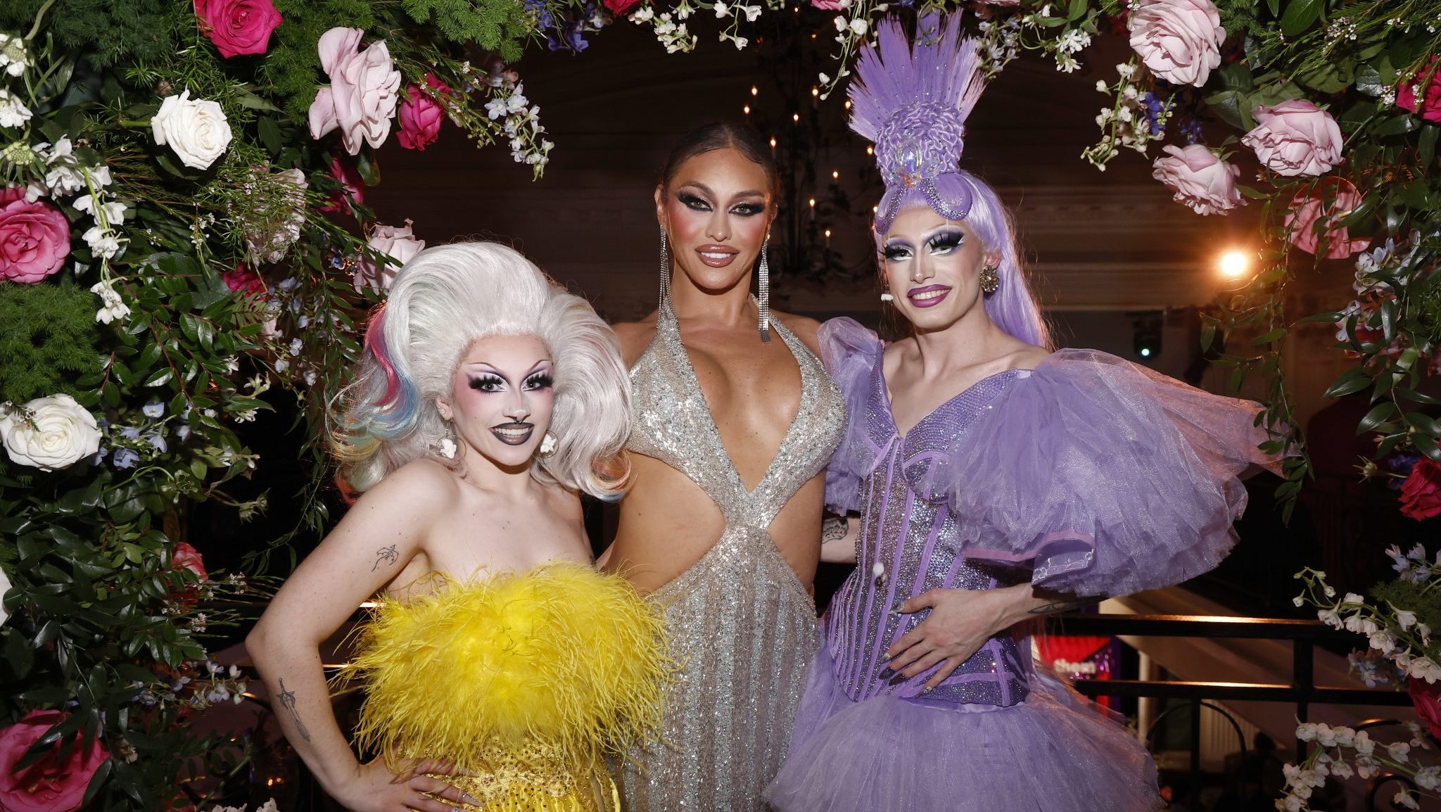 WASHINGTON, DC - MAY 30: Sasha Colby (center) and guests attend as Them and Destination DC kick off World Pride 2025 at Succotash on May 30, 2025 in Washington, DC.
