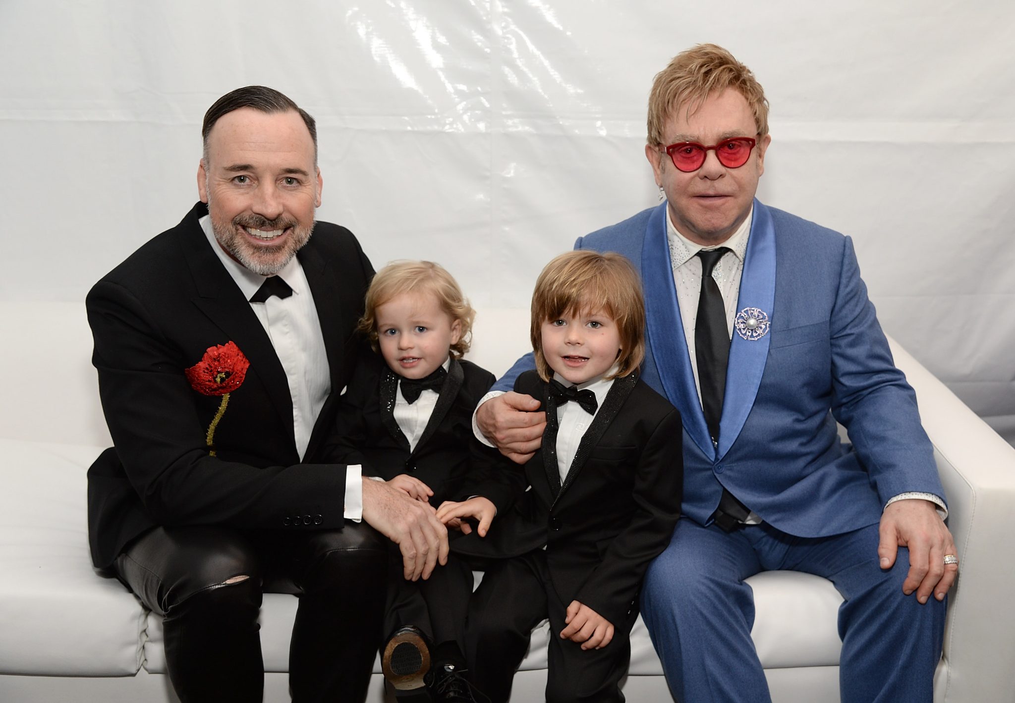 (L-R) David Furnish, Elijah Furnish-John, Zachary Furnish-John, and Sir Elton John attend the 23rd Annual Elton John AIDS Foundation Academy Awards Viewing Party on February 22, 2015 in Los Angeles, California.