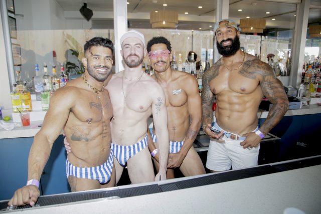 Bartenders at The Blue Whale attend as Tryst Hospitality celebrates the 50th Invasion of Fire Island Pines on July 04, 2025 in Sayville, New York. (Photo by Santiago Felipe/Getty Images for Tryst Hospitality)
