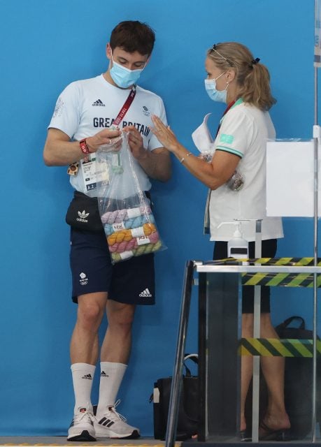 Tom Daley of Great Britain is seen with a bag of wool during the Men's 3m Springboard final on day eleven of the Tokyo 2020 Olympic Games at Tokyo Aquatics Centre on August 03, 2021 in Tokyo, Japan.