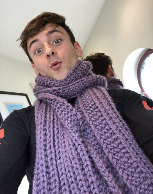 Tom Daley's first thing he even knitted, a purple scarf. 