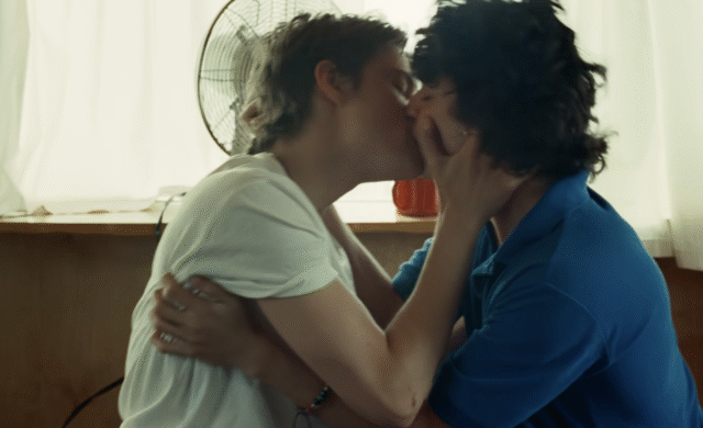 Intimate scene between Conan's character and Brando from the 'Caramel' music video.