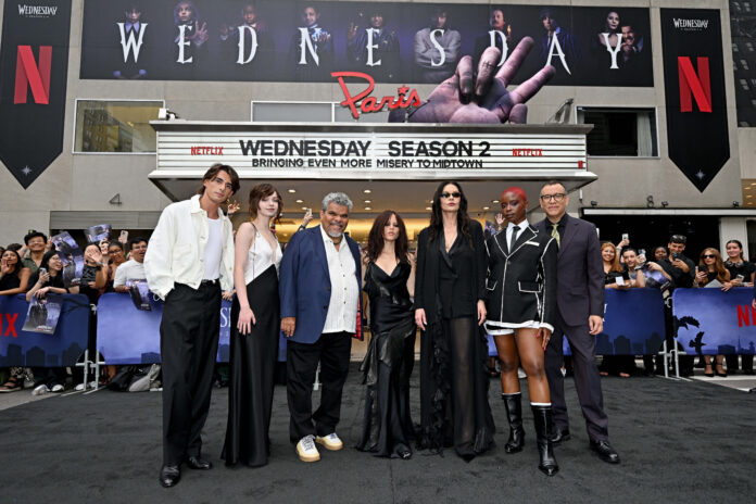 NEW YORK, NEW YORK - AUGUST 05: (L-R) Georgie Farmer, Emma Myers, Luis Guzmán, Jenna Ortega, Catherine Zeta-Jones, Joy Sunday and Fred Armisen attend the Wednesday S2 NY Fan Screening at Paris Theater on August 05, 2025 in New York City. (Photo by Roy Rochlin/Getty Images for Netflix)