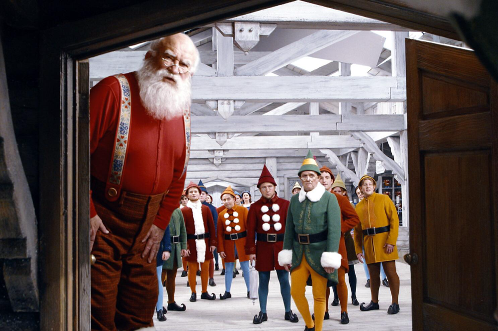 Ed Asner as Santa in Elf (2003)
