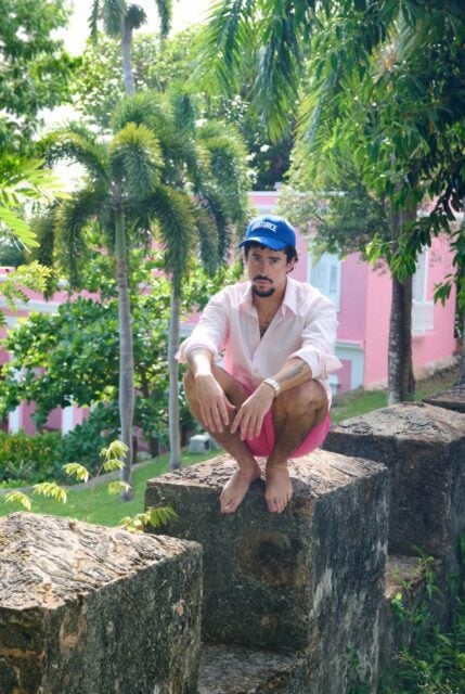 Bad Bunny opens up about why his tour skipped the U.S., citing ICE concerns, Puerto Rico pride, and a deeper connection to his musical roots.