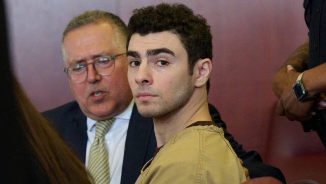 Luigi Mangione (R) appears with his lawyer Marc Agnifilo in court for a hearing on his state murder charges in the killing of UnitedHealthcare CEO Brian Thompson in Manhattan Supreme Court on September 16, 2025 in New York City. Mangione is accused of murdering UnitedHealthcare CEO Brian Thompson late last year. He is facing 11 counts for the December 4th shooting outside a midtown Manhattan hotel, which set off a massive manhunt. He is also facing federal charges of murder and other charges in Pennsylvania, where he was arrested.