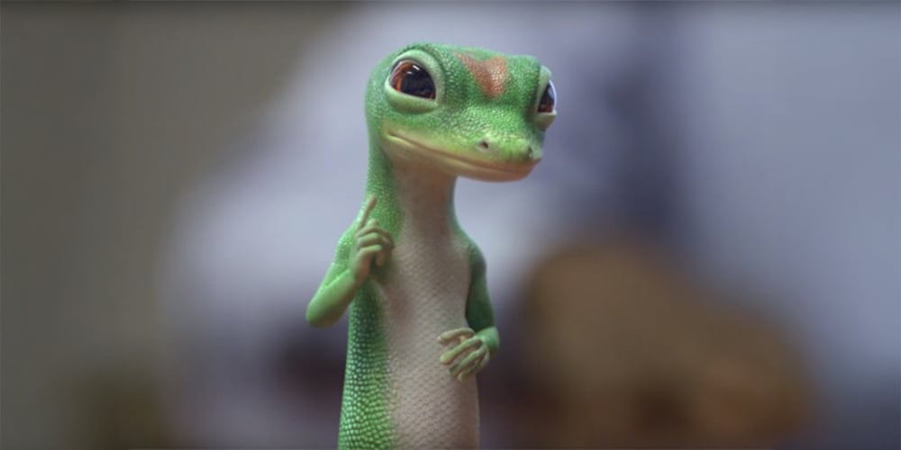 The Geico Gecko mascot from Geico ads, the cheeky green lizard with a British accent.