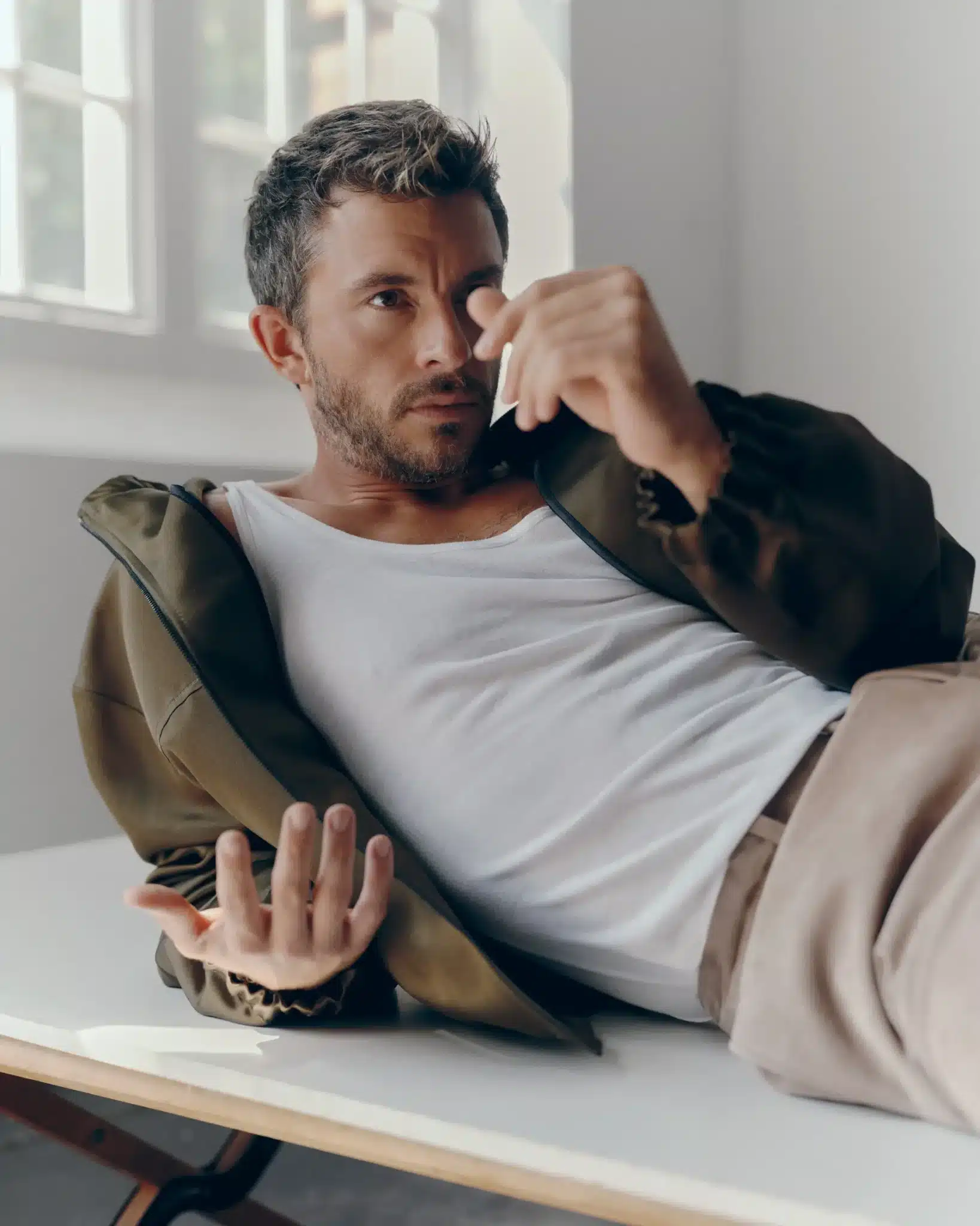 Jonathan Bailey wows in a new TIME photoshoot and interview, reflecting on his career, Wicked, and finding balance between fame and family.