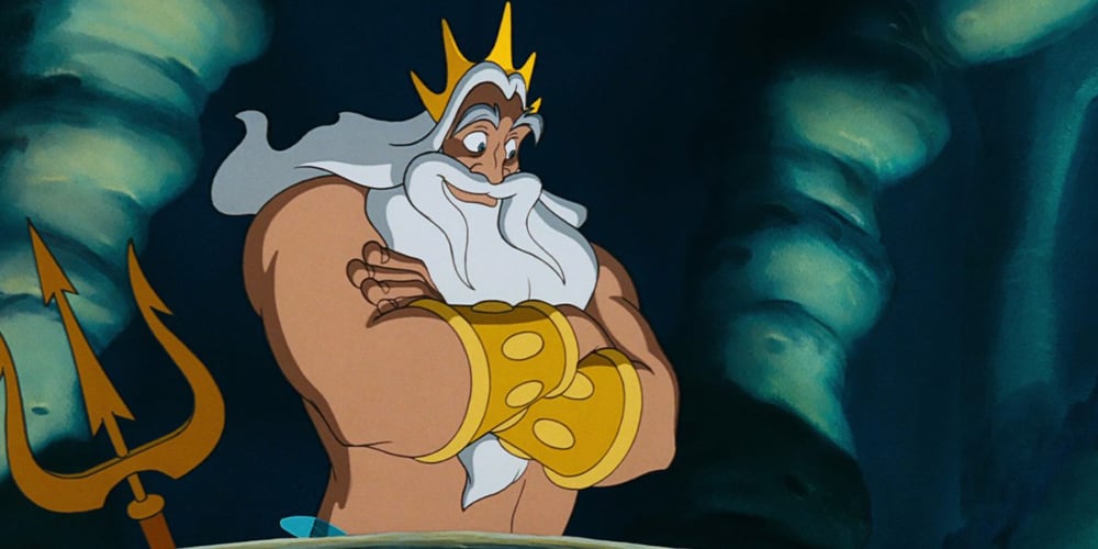 King Triton from The Little Mermaid, muscular merman with crown and trident.