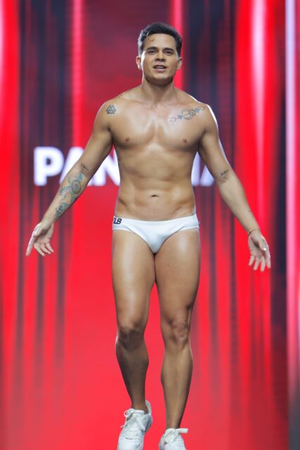 The men of Mister Global 2025 walk the stage for the swimsuit category in Thailand.
