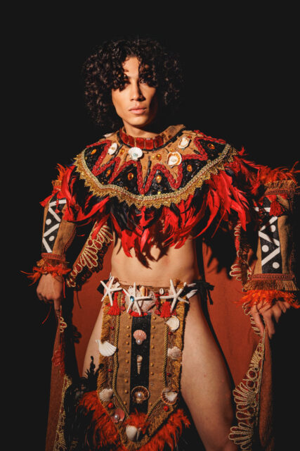 The men of Mister Global 2025 dressed in costume celebrating their unique cultural heritage.