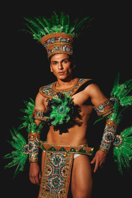 The men of Mister Global 2025 dressed in costume celebrating their unique cultural heritage.