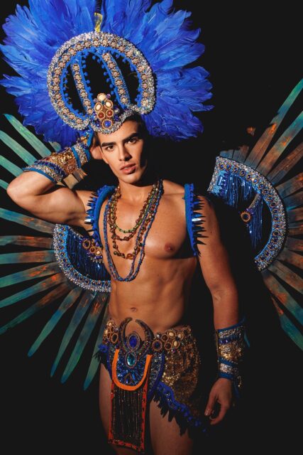 The men of Mister Global 2025 dressed in costume celebrating their unique cultural heritage.