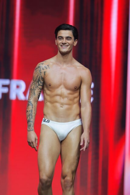 The men of Mister Global 2025 walk the stage for the swimsuit category in Thailand.