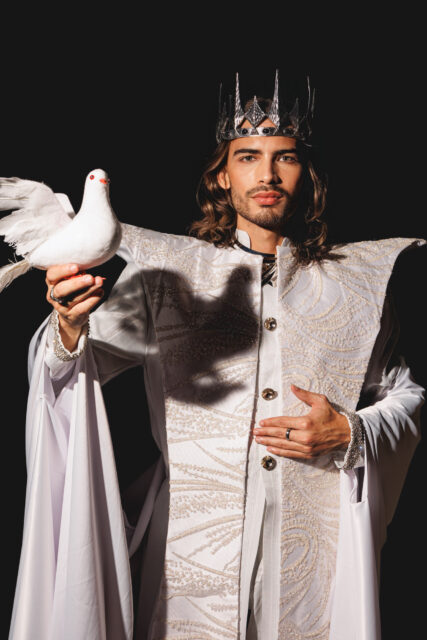 The men of Mister Global 2025 dressed in costume celebrating their unique cultural heritage.