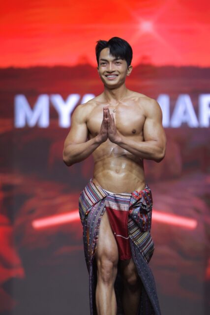 The men of Mister Global 2025 walk the stage in traditional Thai attire.