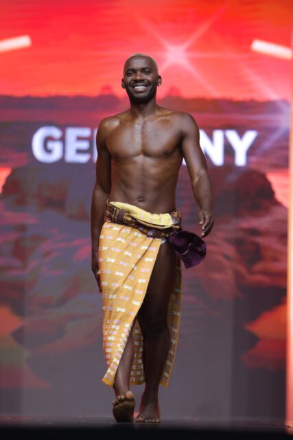 The men of Mister Global 2025 walk the stage in traditional Thai attire.