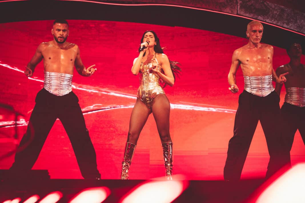 Dua Lipa kicked off the first night of her four-night Radical Optimism takeover at The Forum, delivering a confident and electrifying start to her LA residency. Photo: Kia Forum/Timothy Norris