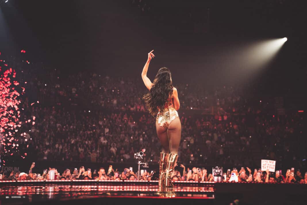 Dua Lipa kicked off the first night of her four-night Radical Optimism takeover at The Forum, delivering a confident and electrifying start to her LA residency. Photo: Kia Forum/Timothy Norris