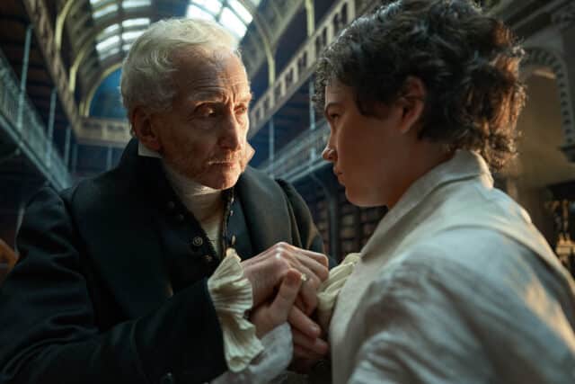 FRANKENSTEIN. (L to R) Charles Dance as Leopold Frankenstein and Christian Convery as Young Victor Frankenstein in Frankenstein. Cr. Ken Woroner/Netflix © 2025.