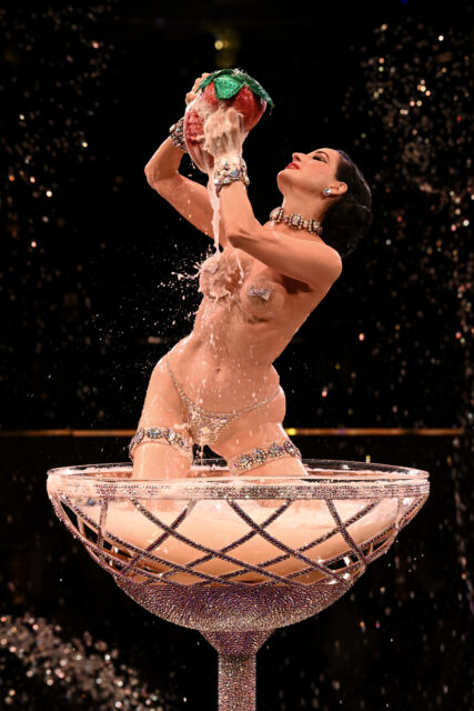 American vedette Dita Von Teese performs during the Alexis Mabille Haute Couture Fall/Winter 2024-2025 show as part of Paris Fashion Week on June 25, 2024 in Paris, France. 