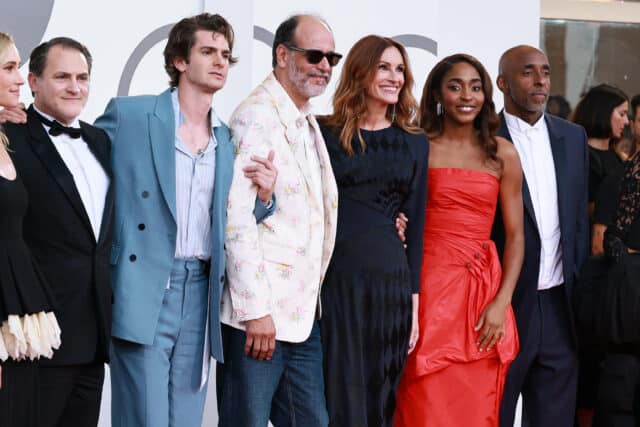 VENICE, ITALY - AUGUST 29: (L-R) Nora Garrett, Michael Stuhlbarg, Andrew Garfield, Luca Guadagnino, Julia Roberts, Ayo Edebiri and Malik Hassan Sayeed attend the "After The Hunt" red carpet during the 82nd Venice International Film Festival on August 29, 2025 in Venice, Italy. (Photo by Theo Wargo/Getty Images)