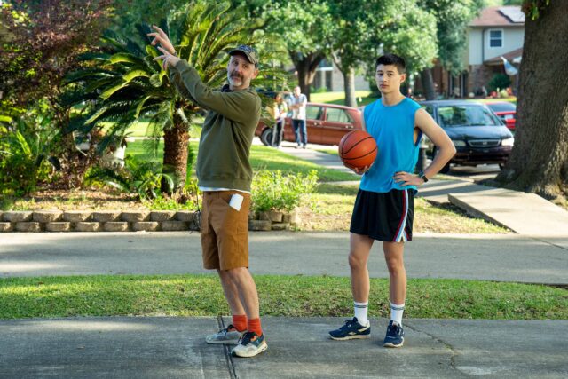 BOOTS. (L to R) Director Peter Hoar (101) and Liam Oh as Ray McAffey behind the scenes of Episode 101 of Boots. Cr. Alfonso "Pompo" Bresciani/Netflix © 2023