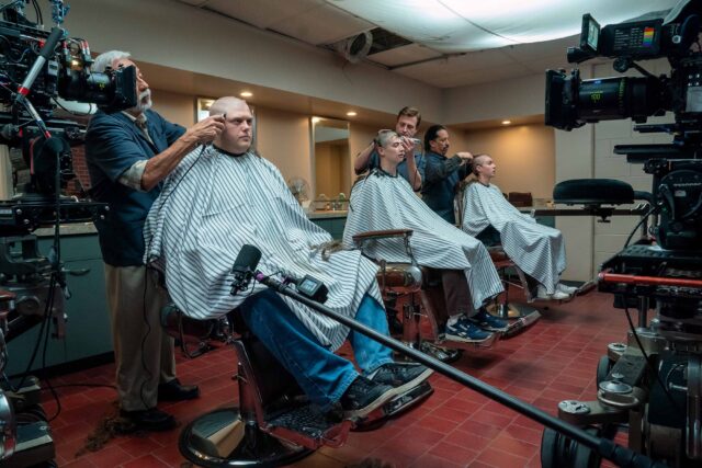 BOOTS. (L to R) Blake Burt as John Bowman, Liam Oh as Ray McAffey, and Miles Heizer as Cameron Cope behind the scenes of Episode 101 of Boots. Cr. Alfonso "Pompo" Bresciani/Netflix © 2023