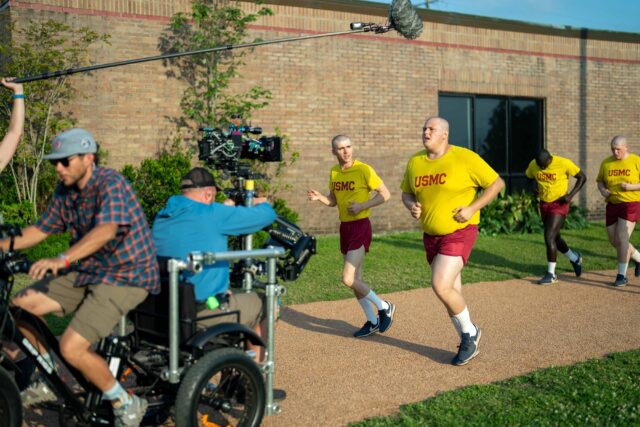 BOOTS. (L to R) Miles Heizer as Cameron Cope and Blake Burt as John Bowman behind the scenes of Episode 101 of Boots. Cr. Alfonso "Pompo" Bresciani/Netflix © 2023