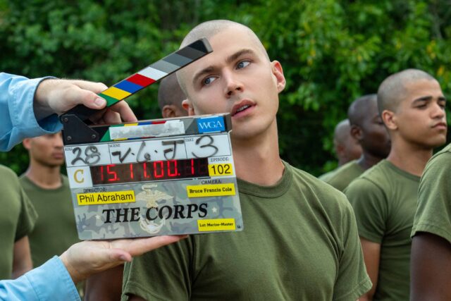 BOOTS. Miles Heizer as Cameron Cope behind the scenes of Episode 101 of Boots. Cr. Alfonso "Pompo" Bresciani/Netflix © 2023