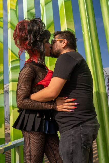 Participants share a kiss at MPact Global Action’s Besoton Sidoso Internacional / International HIV Kiss-In