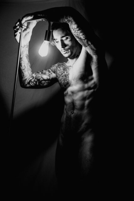 Photographer Connor Clayton captures statuesque male nudes with contrast, intention, and intimacy, reshaping how masculinity is seen in art.