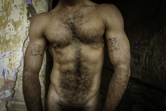 Photos of exposed men in ruins by Ahmad Naser