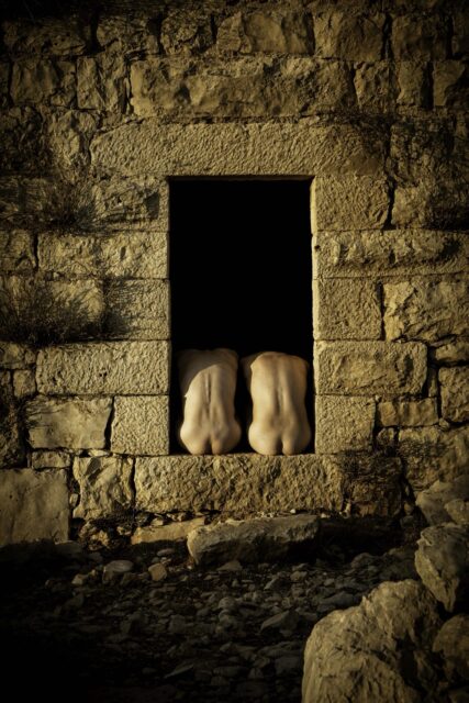 Photos of exposed men in ruins by Ahmad Naser