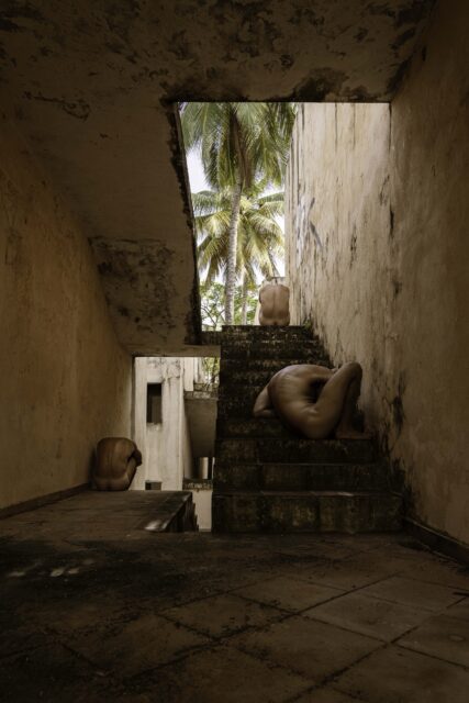 Photos of exposed men in ruins by Ahmad Naser