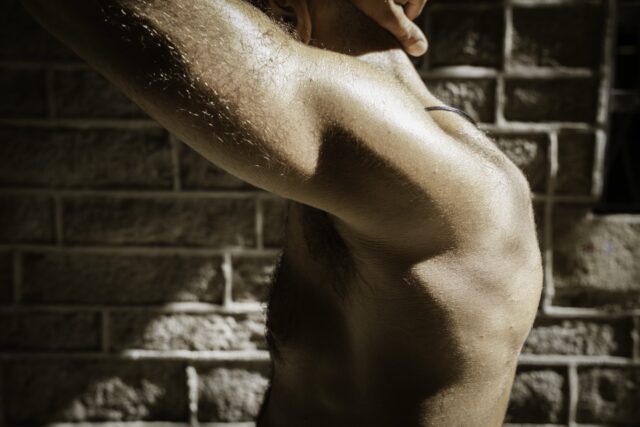 Photos of exposed men in ruins by Ahmad Naser