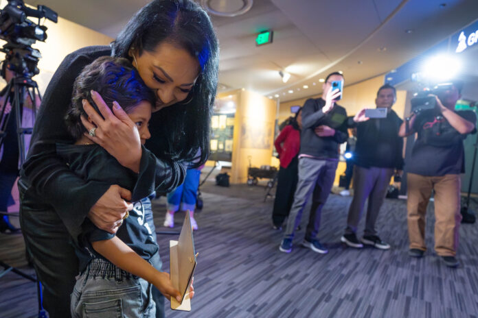 Suzette Quintanilla greets St. Jude patient Valentina in a celebration of the opening of the Selena: From Texas To The World, a special pop-up exhibit celebrating the performer’s legacy at the Grammy Museum in Los Angeles, Ca. on Wednesday, January 14, 2026. Photo: ALSAC/St. Jude