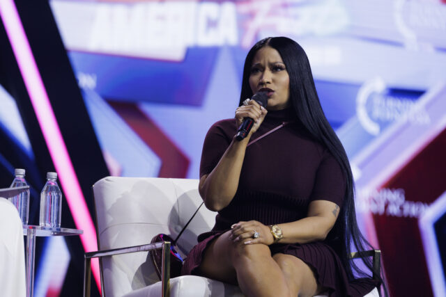 Surprise guest Nicki Minaj is interviewed by Erika Kirk on the final day of Turning Point USA's annual AmericaFest conference at the Phoenix Convention Center on December 21, 2025 in Phoenix, Arizona. Minaj spoke about her frustrations with California Governor Gavin Newsom, and about why she has embraced the conservative movement. 