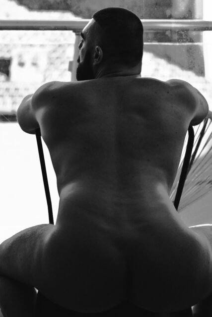 Filmmaker and Egyptologist Curtis Woodside opens up about body confidence, vulnerability, and reclaiming self-expression through a nude shoot in Milan.