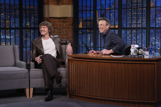 Pictured: (l-r) Actor Connor Storrie during an interview with host Seth Meyers on January 12, 2026