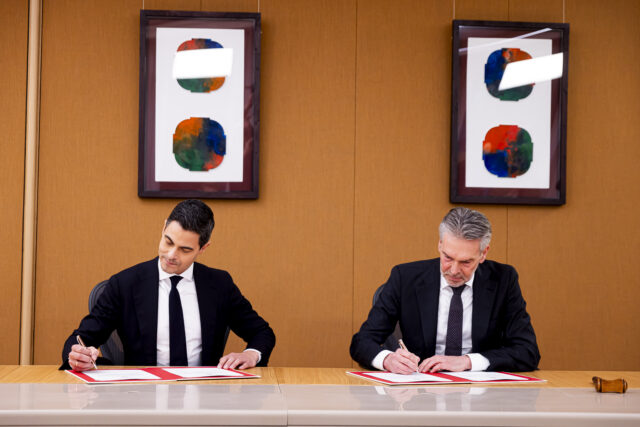 Prime Minister Rob Jetten (R) and former Prime Minister Dick Schoof (C) attend the portfolio transfer at the ministry of general affairs on February 23, 2026 in The Hague, Netherlands.  