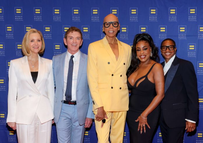 (L-R) Lisa Kudrow, Michael Patrick King, RuPaul, Niecy Nash-Betts and Jessica Betts attend Human Rights Campaign's 2026 Los Angeles Dinner at Fairmont Century Plaza on March 28, 2026 in Los Angeles, California. (Photo by Amy Sussman/Getty Images for Human Rights Campaign)