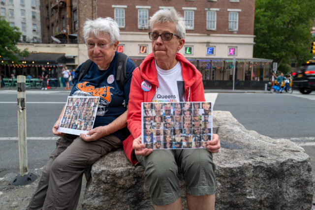 Members of the activist group Gays Against Guns hold pictures of the deceased during a silent vigil to mark seven years since the Pulse Nightclub mass shooting, one of the worst mass shootings in American history, on June 12, 2023 in New York City. The vigil began at the Stonewall Inn, a gay bar and National Historic Landmark in Manhattan's West Village. On June 12, 2016, Omar Mateen, a 29-year-old man, killed 49 people and wounded 53 more in a mass shooting at Pulse, a gay nightclub in Orlando, Florida.