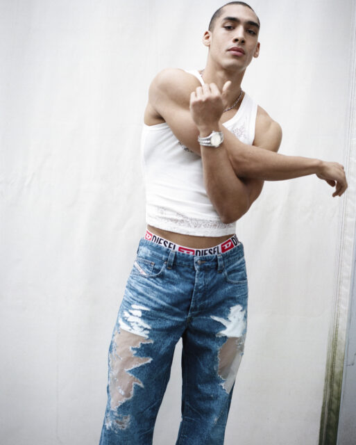 Diesel and Tinder launch a Pride 2026 campaign starring Gigi Goode, plus a queer-focused capsule collection and $200K LGBTQ+ donation.