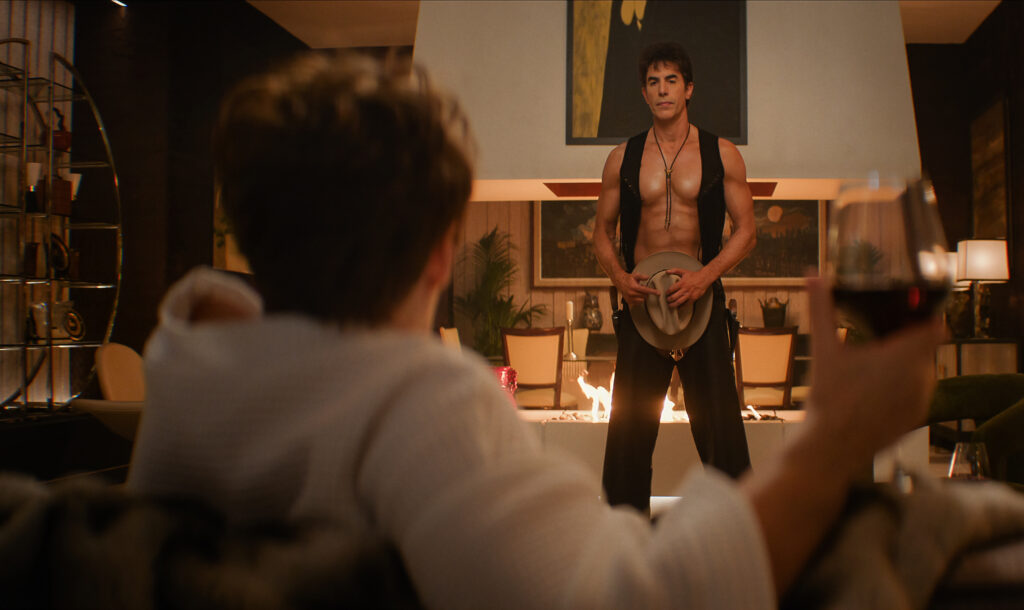 Ladies First. (L-R) Fiona Shaw as Felicity Chase and Sacha Baron Cohen as Damien Sachs in Ladies First. Cr. Netflix © 2026.