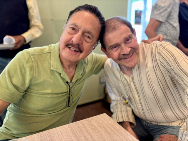 Project Rainbow LGBTQ+ seniors celebrate Pride in West Hollywood with pizza, stories, and community support through JFSLA’s long-running program.