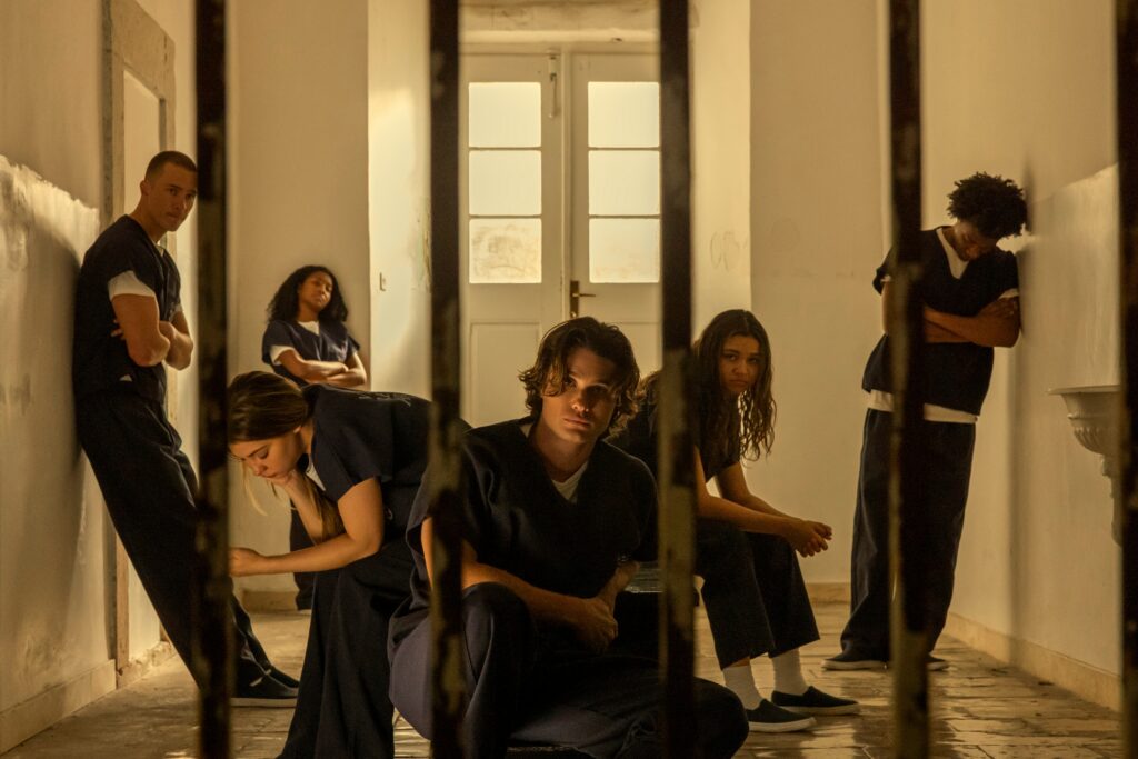 Outer Banks. (L to R) Drew Starkey as Rafe, Madelyn Cline as Sarah Cameron, Carlacia Grant as Cleo, Chase Stokes as John B, Madison Bailey as Kiara, Jonathan Daviss as Pope in episode 503 of Outer Banks. Cr. Jackson Lee Davis/Netflix © 2026